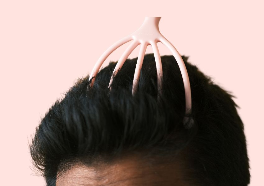 scalp massager on head